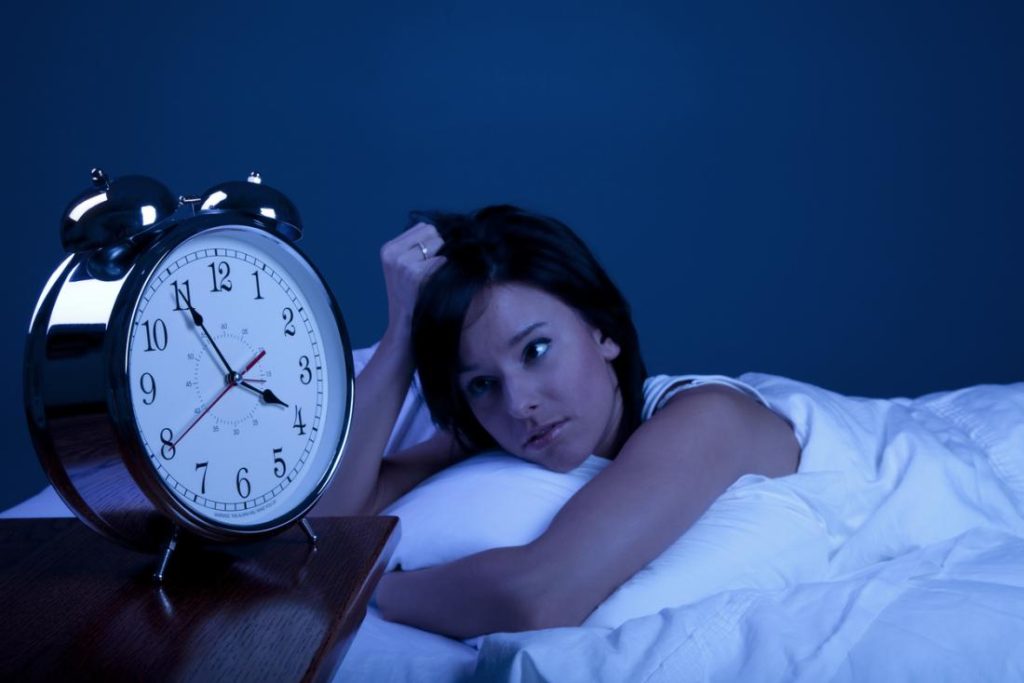 woman unable to sleep